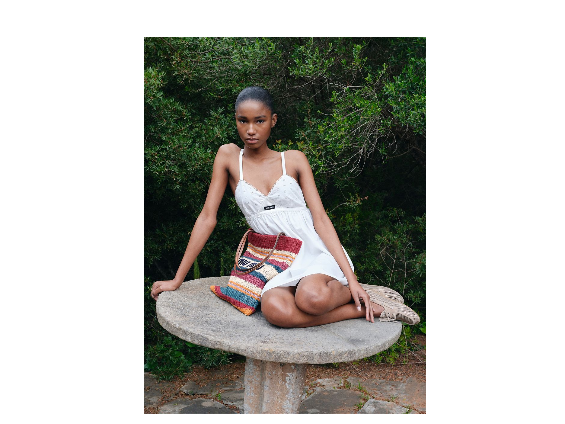 www.farfetch.com